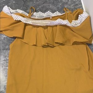 mustard yellow shirt